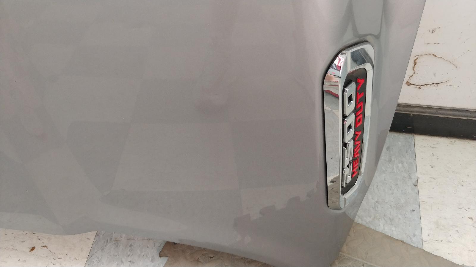 DENTED 2019-2024 Dodge Ram 2500 3500 OEM Hood Panel Billet Silver 68360786AE 9 DENTED 2019-2024 Dodge Ram 2500 3500 OEM Hood Panel Billet Silver 68360786AE - Image 9